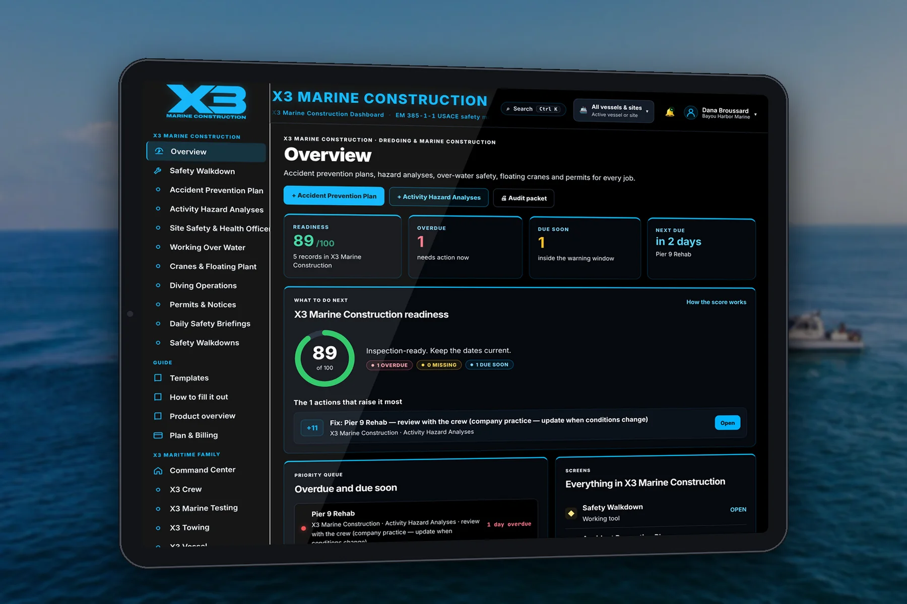 The X3 Marine Construction dashboard on a tablet, showing a sample project's readiness score and next actions